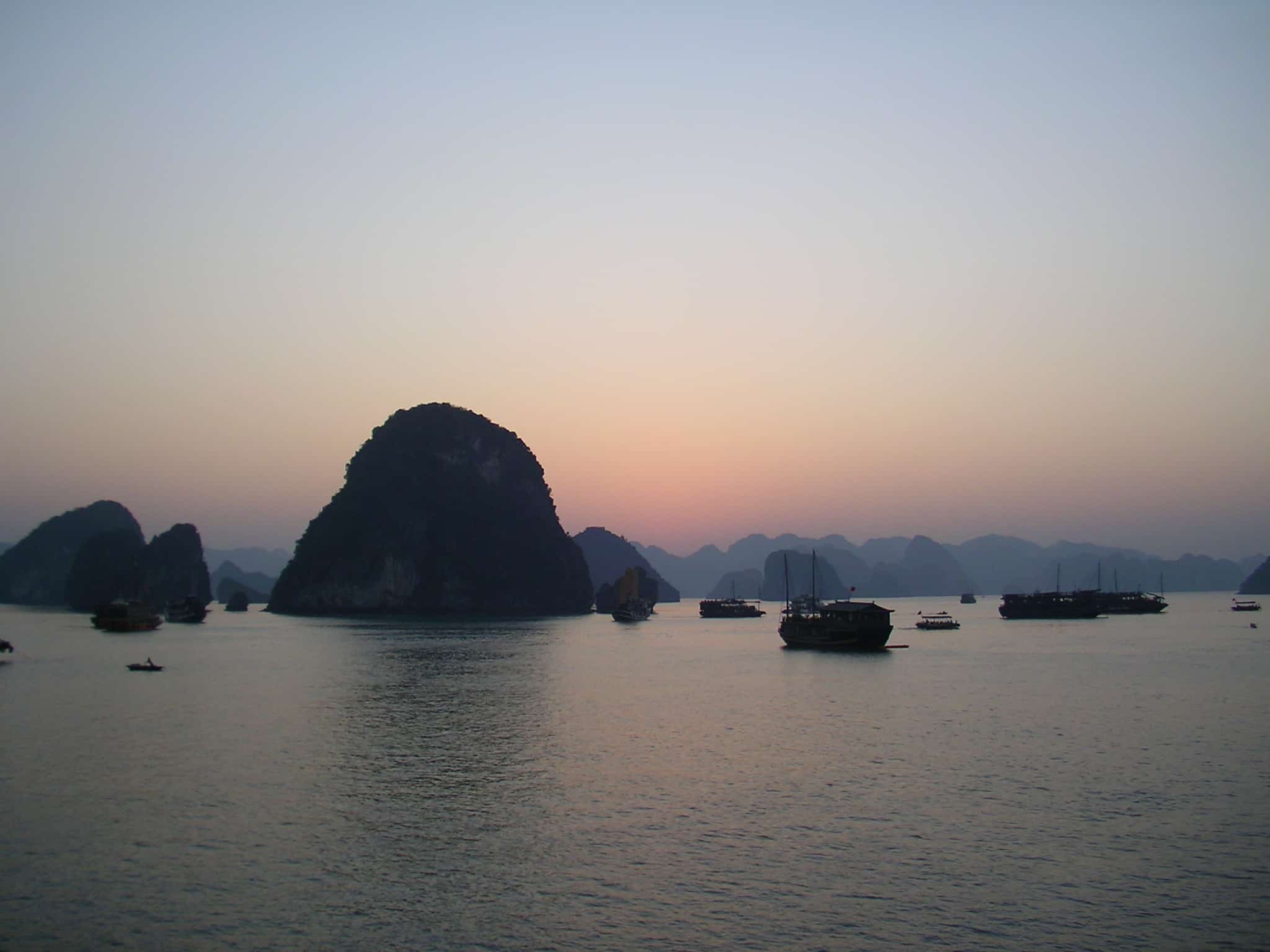 Halong Bay at sunset Halong bay, sunset, north, vietnam, natural wonder, gulf of tonkin