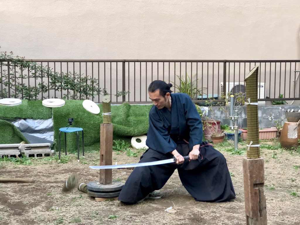 Japan wakizashi samurai holding a wazikashi sword and practicing